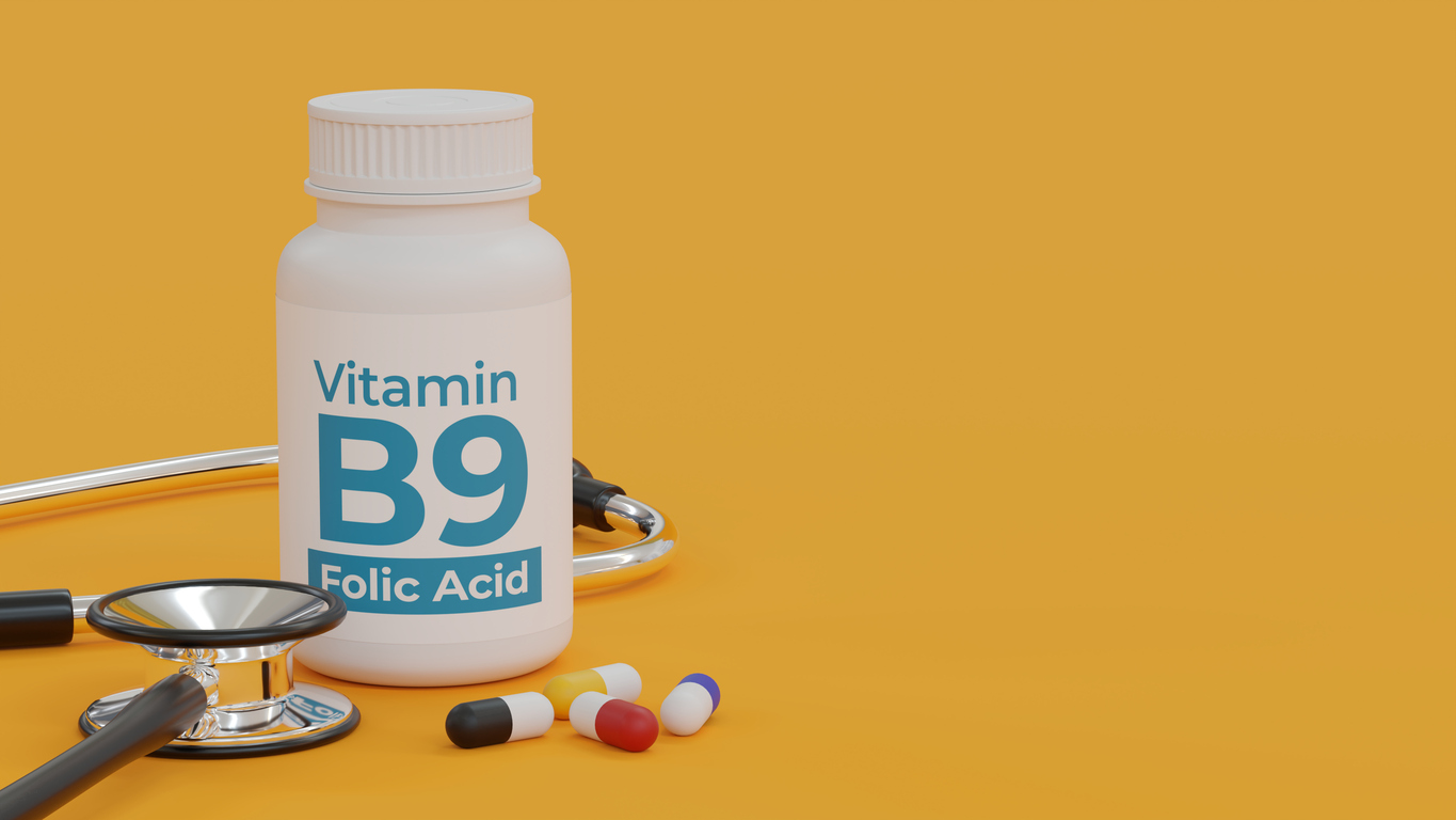 Vitamin B9 supplement folic acid bottle on yellow background 3d illustration. Folic acid aid proper blood formation and prevention of some serious birth defects.